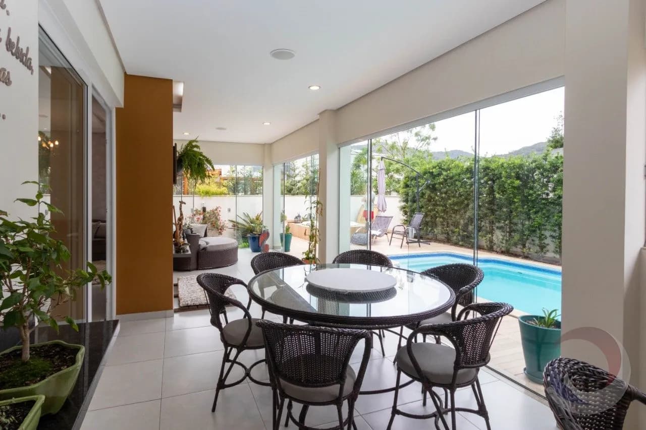 Casa de condomínio para venda com 4 dormitórios em Rio Tavares com 328 m² — foto principal