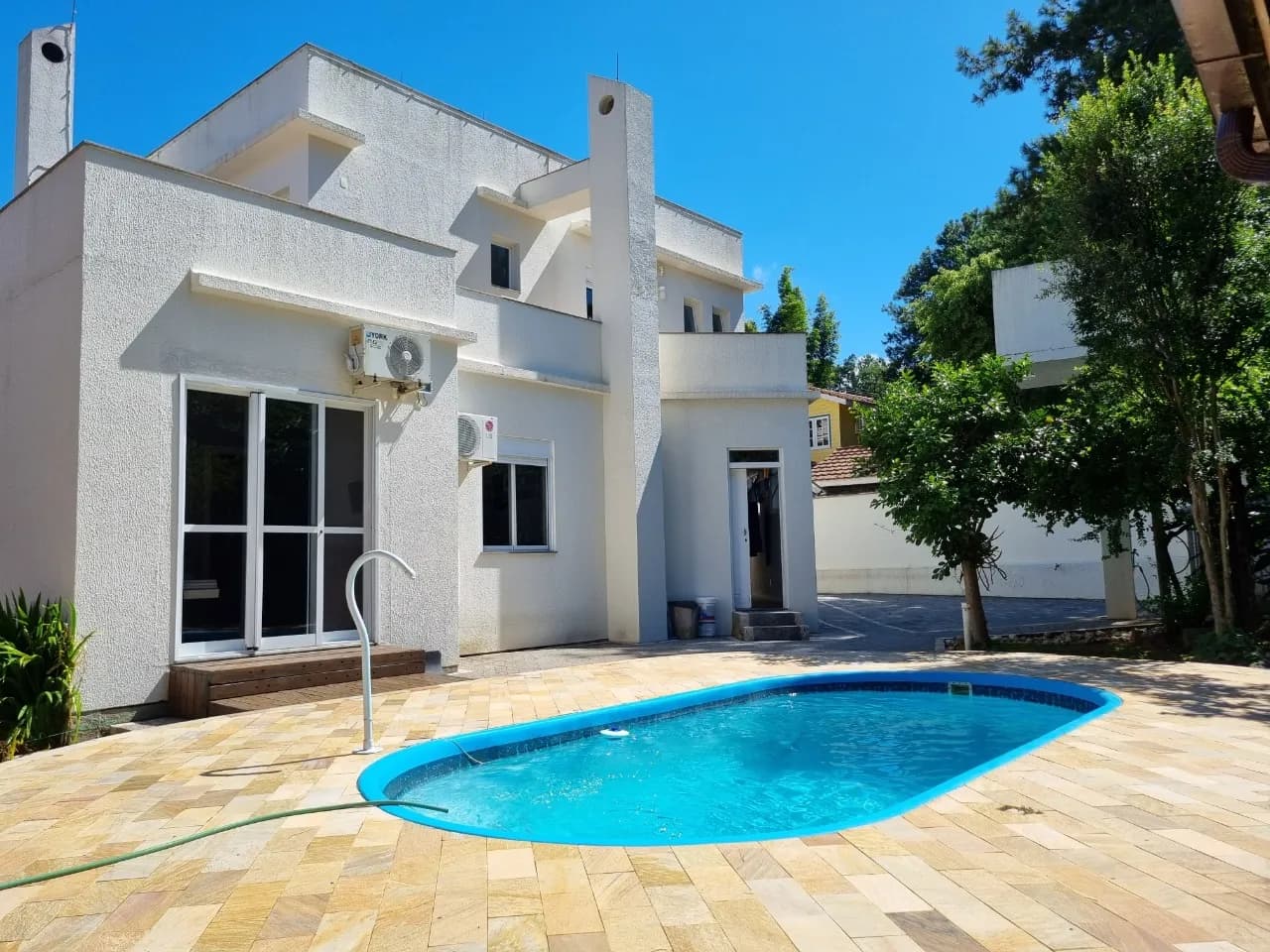 Casa para venda com 4 dormitórios em Cacupé com 444 m² — foto principal