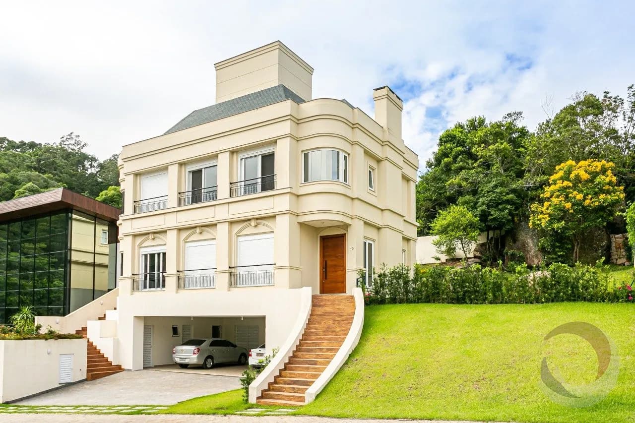 Casa de condomínio para venda com 4 dormitórios em Cacupé com 319 m² — foto principal