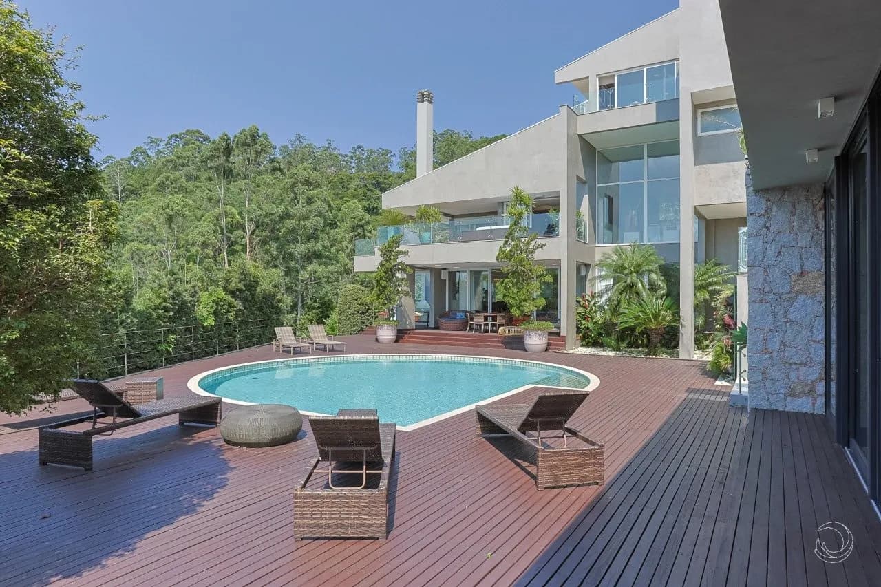 Casa de condomínio para venda com 4 dormitórios em Cacupé com 665 m² — foto principal