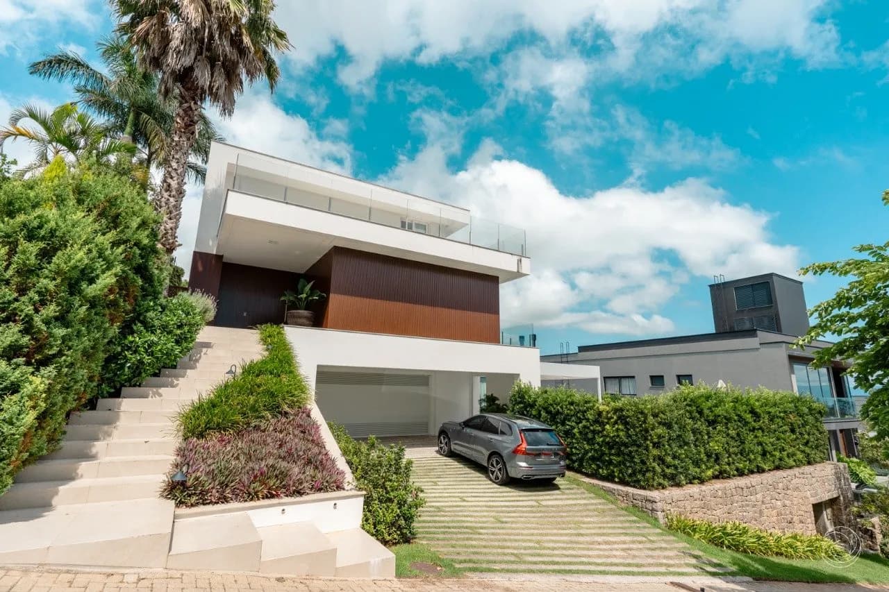 Casa de condomínio para venda com 4 dormitórios em Cacupé com 604 m² — foto principal
