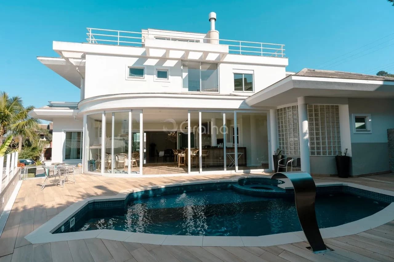 Casa para venda com 4 dormitórios em Cacupé com 499 m² — foto principal