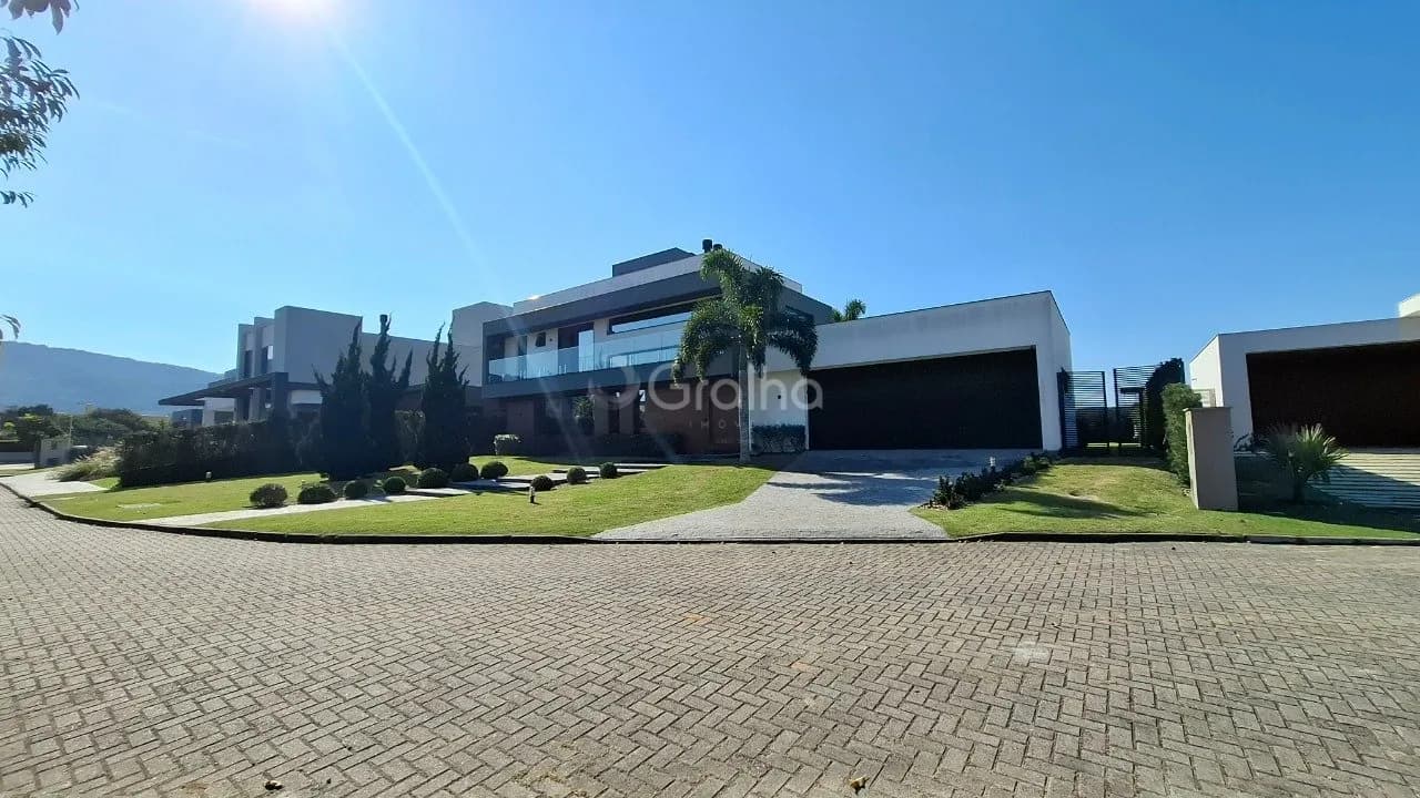Casa de condomínio para venda com 4 dormitórios em Rio Tavares com 459 m²