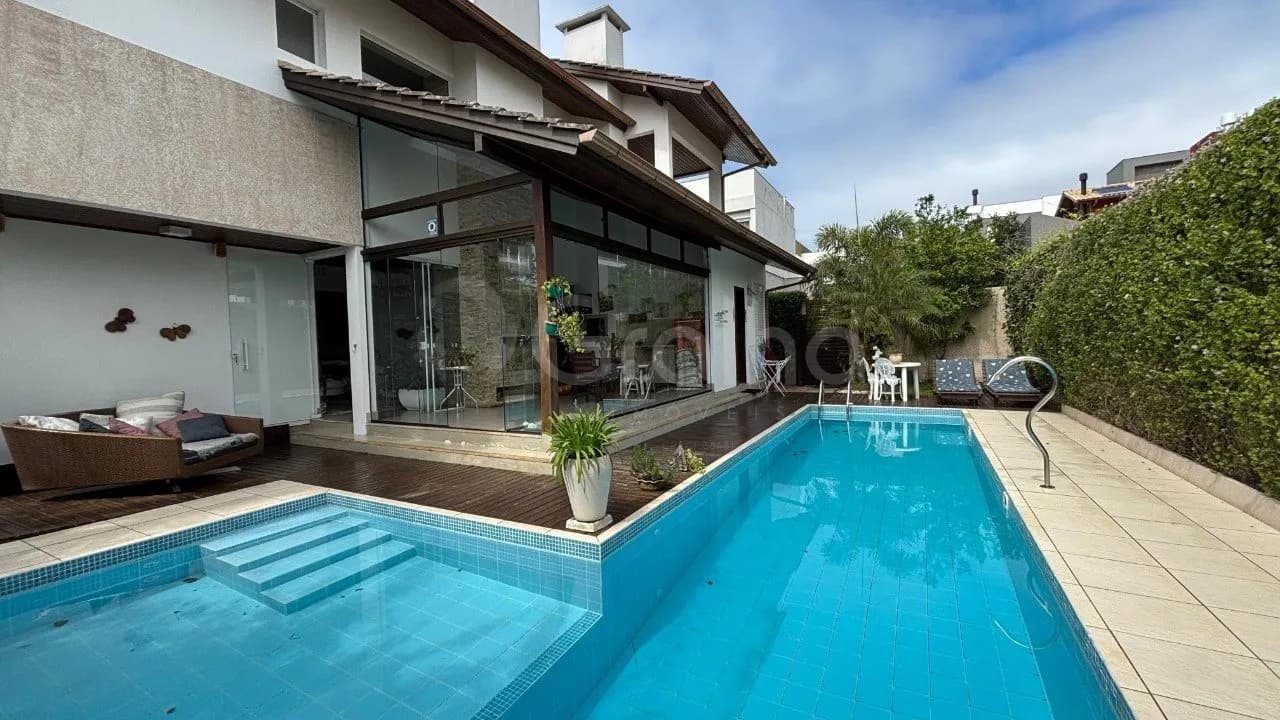Casa de condomínio para venda com 5 dormitórios em Campeche com 417 m² — foto principal