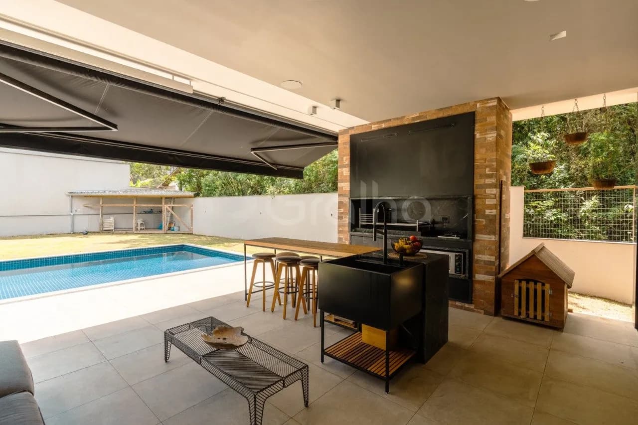 Casa de condomínio para venda com 4 dormitórios em Cacupé com 615 m² — foto 3