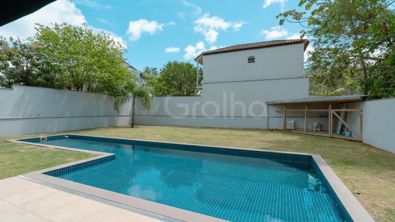 Casa de condomínio para venda com 4 dormitórios em Cacupé com 615 m² — foto 4