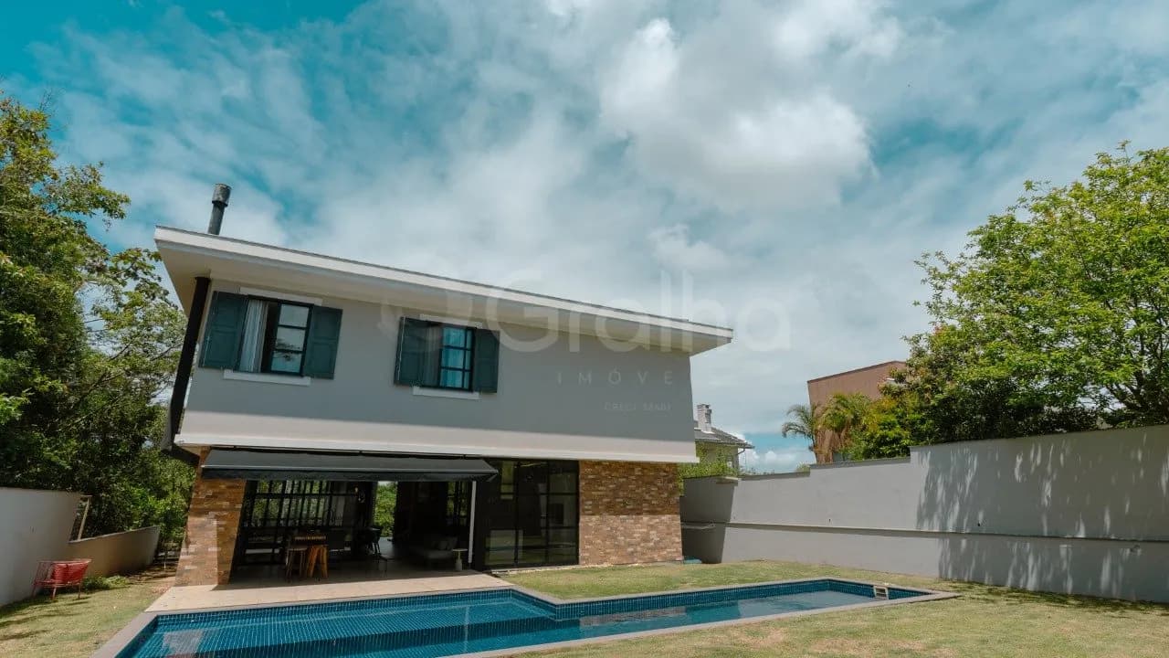 Casa de condomínio para venda com 4 dormitórios em Cacupé com 615 m² — foto 5