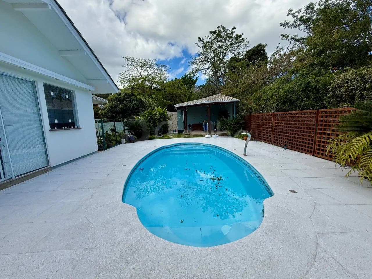 Casa de condomínio para venda com 3 dormitórios em Cacupé com 295 m² — foto 3