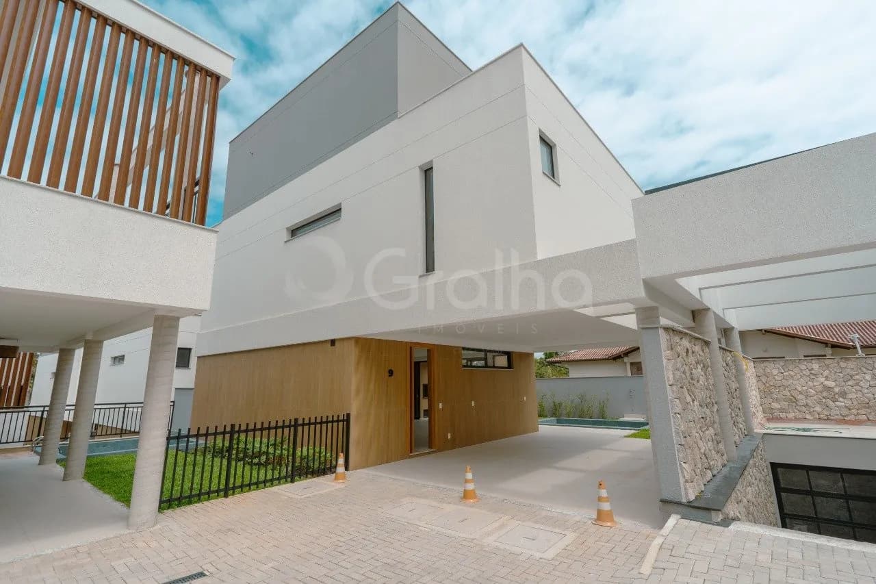 Casa de condomínio para venda com 4 dormitórios em Cacupé com 273 m² — foto principal