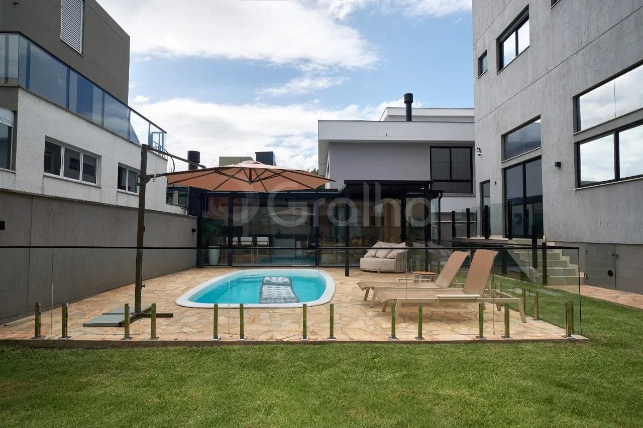 Casa de condomínio para venda com 3 dormitórios em Itacorubi com 280 m² — foto principal