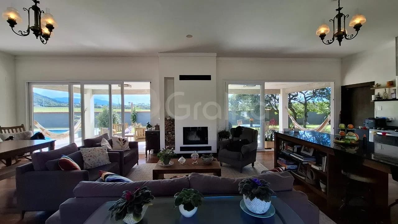 Casa de condomínio para venda com 3 dormitórios em Rio Tavares com 304 m² — foto 4