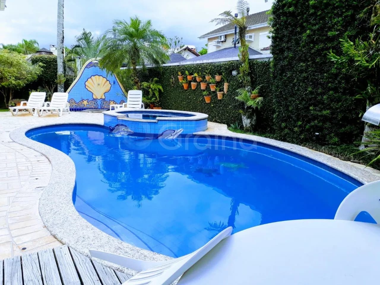 Casa para venda com 4 dormitórios em Jurerê Internacional com 378 m² — foto principal