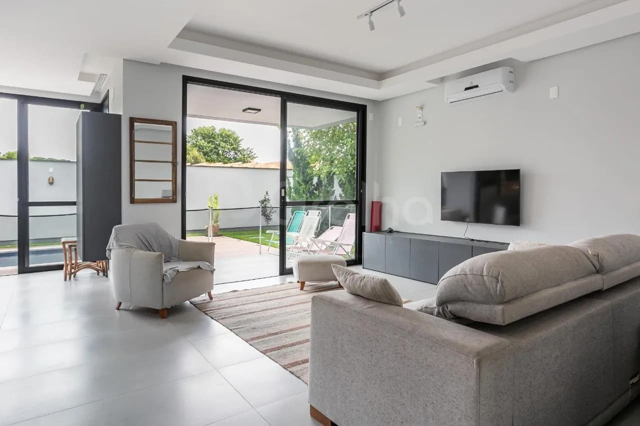 Casa de condomínio para venda com 3 dormitórios em Rio Tavares com 233 m² — foto principal